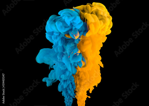 Blue and yellow paint clouds in water isolated on black background. Acrylic colors and ink in water. Abstract backround. Isolated. Bright colorful art. Copy space for banner, poster design. Ukraine