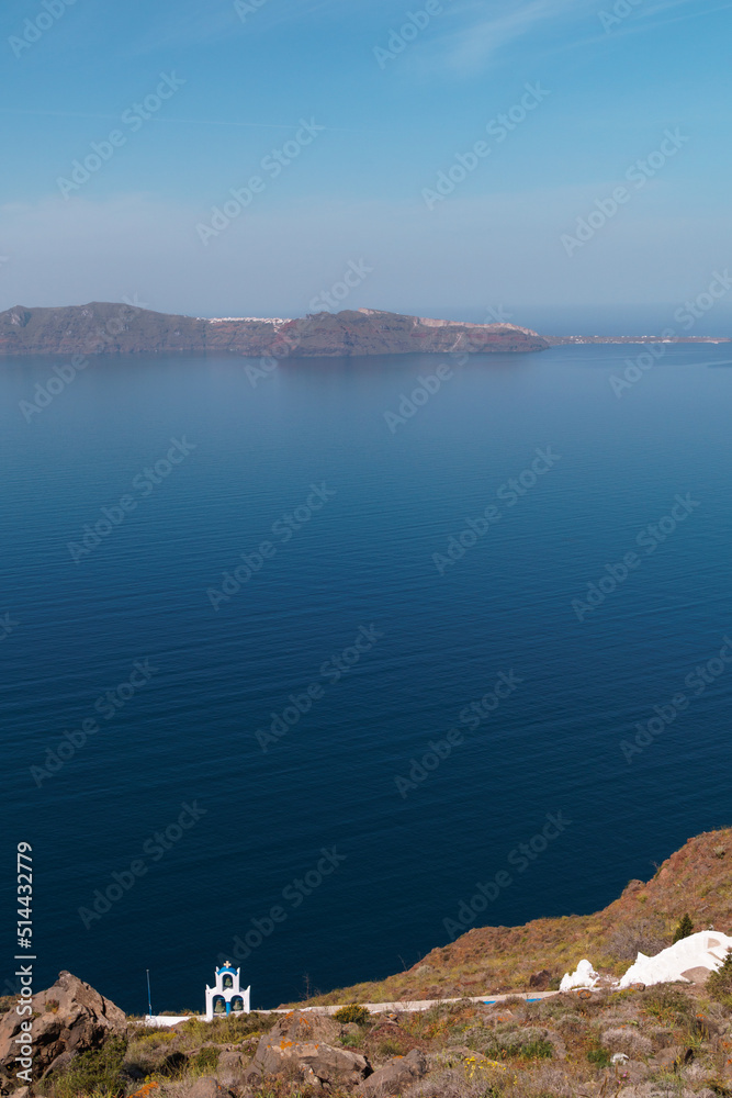 Dome church building in Santorini Greece. Blue sky background. Famous landmarks on greek island in 2022. Dome church building in Santorini Greece. Blue sky background. Famous landmarks on greek island in 2022.