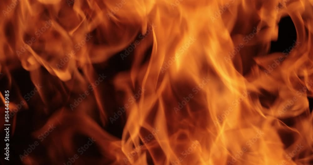 Flames of fire on black background in slow motion Flames of fire on black background in slow motion