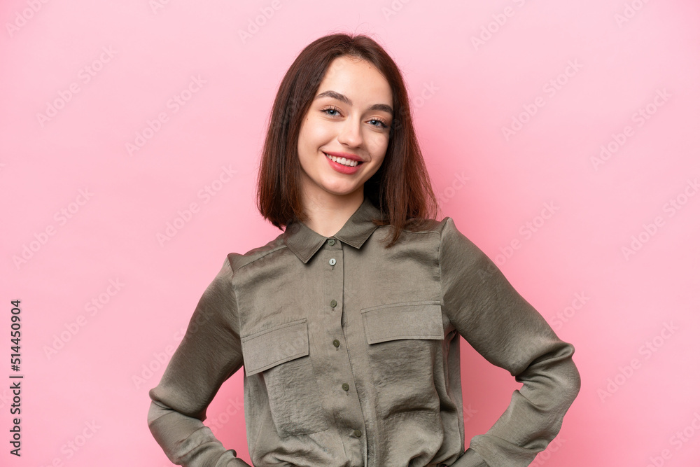 Young Ukrainian woman isolated on pink background laughing Young Ukrainian woman isolated on pink background laughing