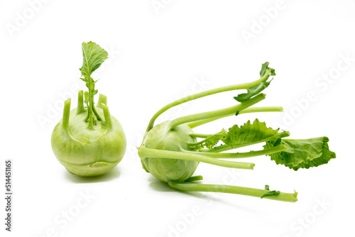 two kohlrabi isolated on white background. selective focus