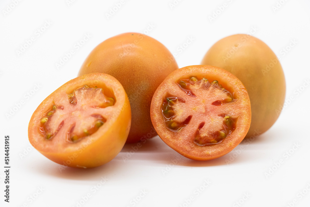 fresh organic tomatoes isolated on white background. fresh organic tomatoes isolated on white background.