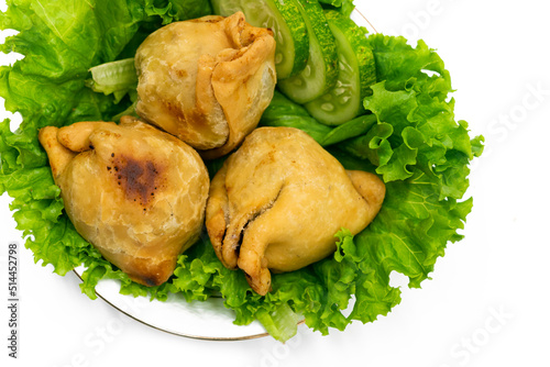 deep fried Singara made by potato and maida, spicy snacks photo