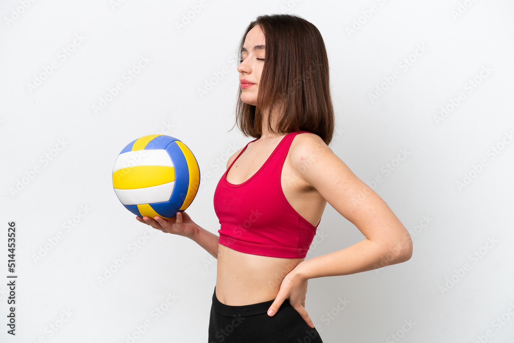 Young Ukrainian woman playing volleyball isolated on white background suffering from backache for having made an effort