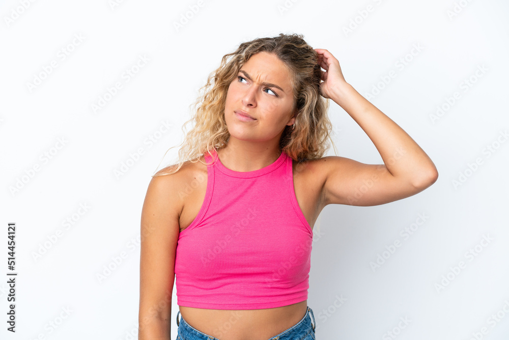 Girl with curly hair isolated on white background having doubts while scratching head Girl with curly hair isolated on white background having doubts while scratching head