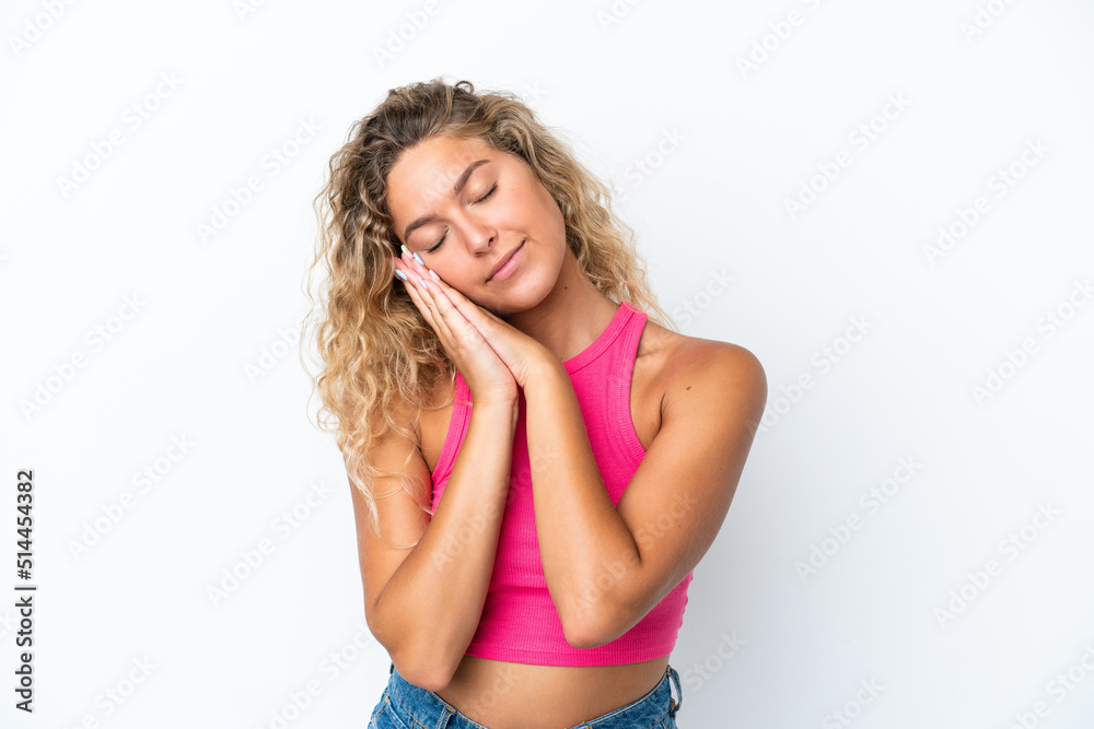 Girl with curly hair isolated on white background making sleep gesture in dorable expression Girl with curly hair isolated on white background making sleep gesture in dorable expression