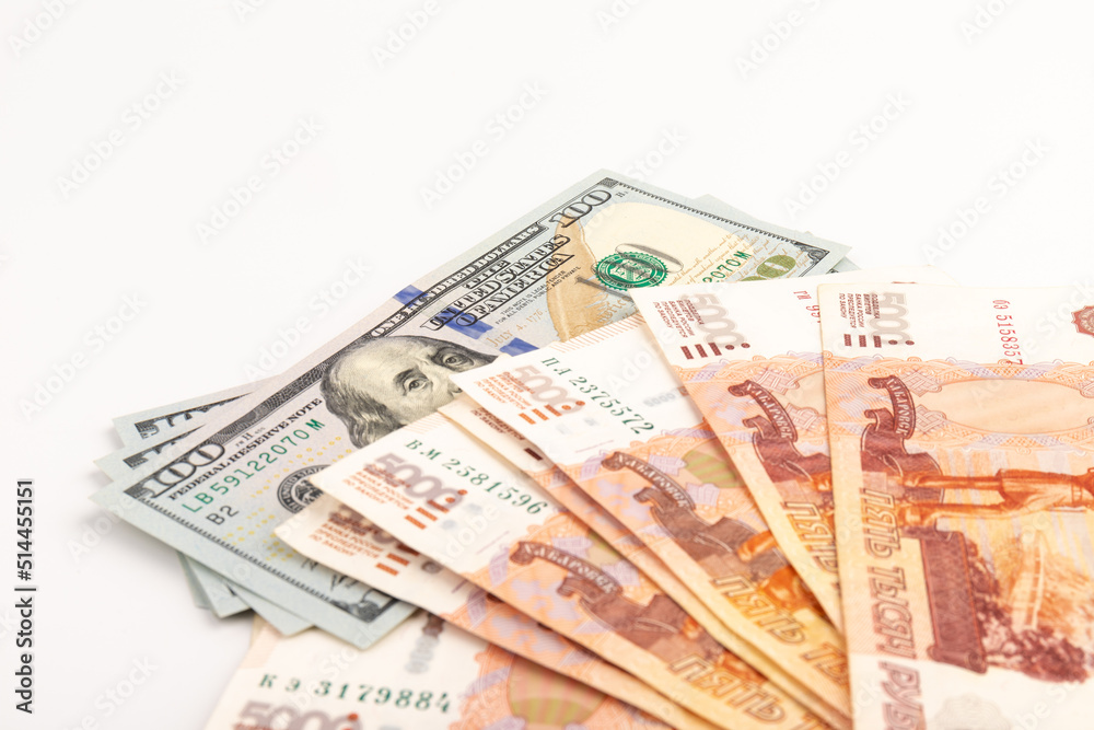 US Dollar and Russian ruble. Money background. Currency exhange. Economic crisis. Rouble dollar cash. Hundred dollar bill and 5000 rubles. Business and finance. Russia and USA US Dollar and Russian ruble. Money background. Currency exhange. Economic crisis. Rouble dollar cash. Hundred dollar bill and 5000 rubles. Business and finance. Russia and USA