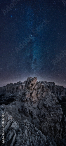 Milky way in the mountains with upright panorama