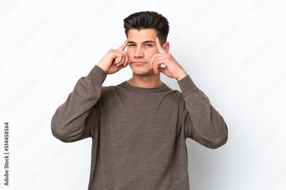 Young handsome caucasian man isolated on white bakcground having doubts and thinking Young handsome caucasian man isolated on white bakcground having doubts and thinking