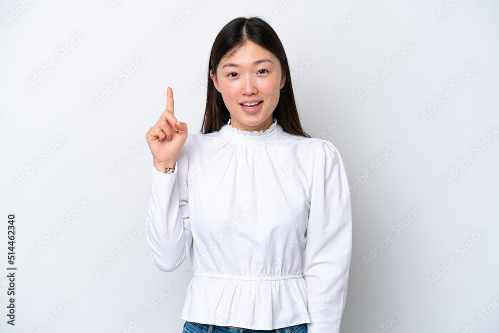 Young Chinese woman isolated on white background pointing up a great idea Young Chinese woman isolated on white background pointing up a great idea