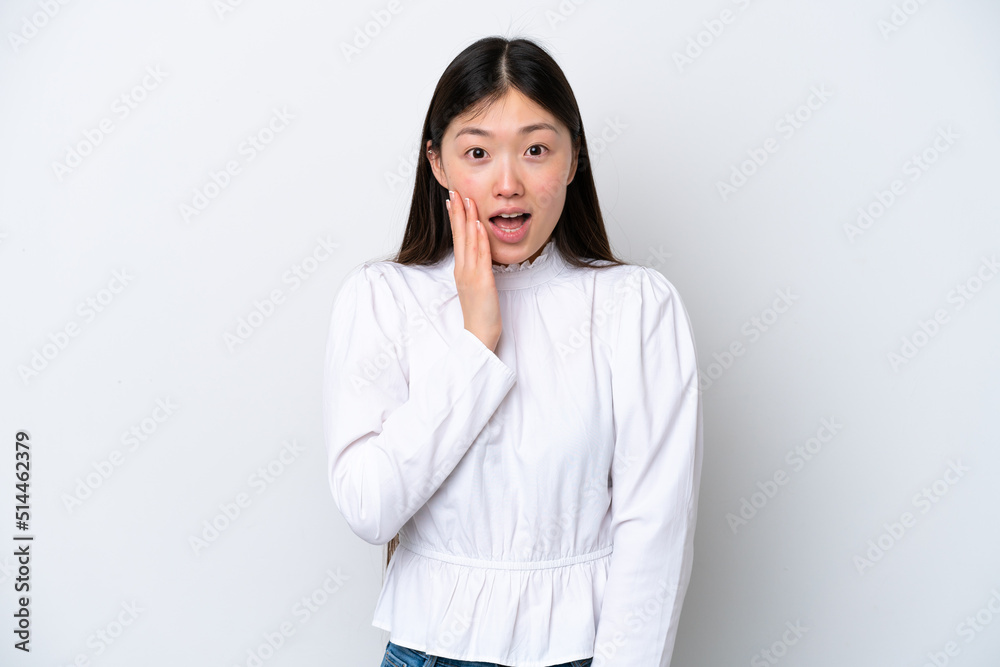 Young Chinese woman isolated on white background with surprise and shocked facial expression Young Chinese woman isolated on white background with surprise and shocked facial expression