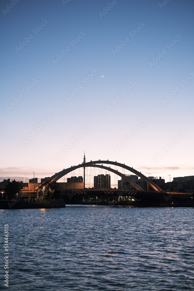 Naklejka premium city harbour bridge at sunset