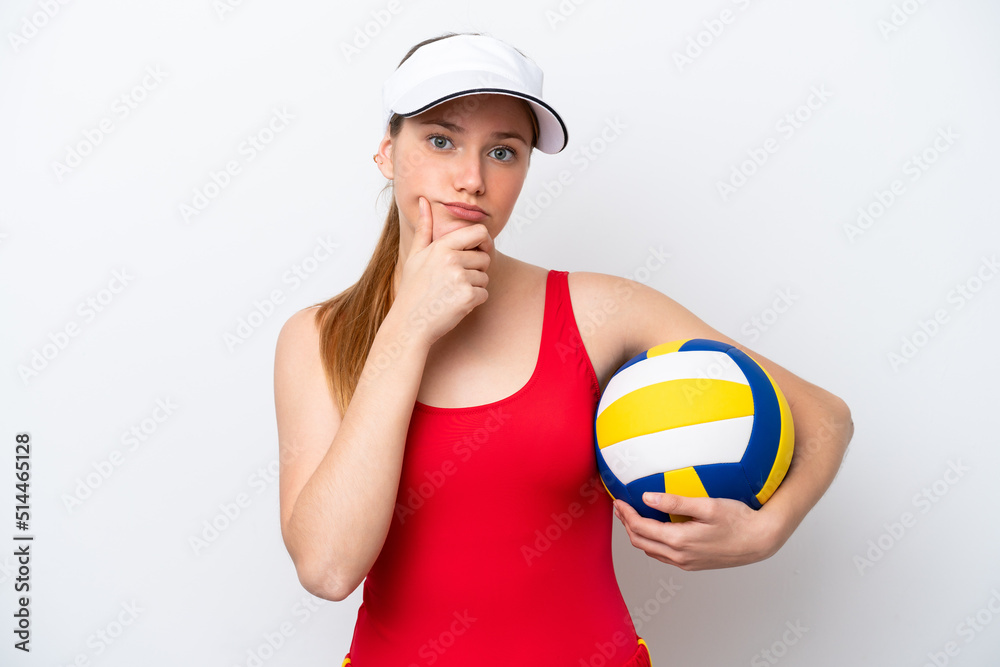 Young caucasian woman playing volleyball isolated on white background thinking