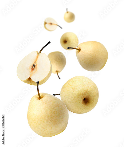 Canvas Print Yellow pear falling down isolated on white background.