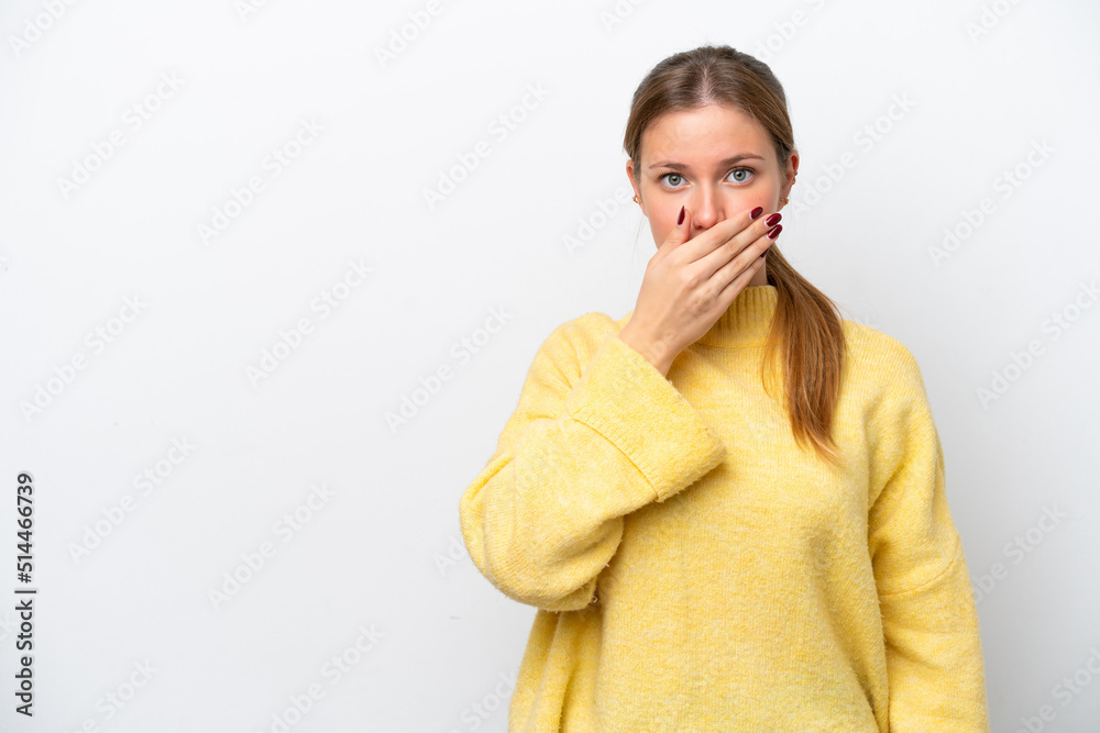Young caucasian woman isolated on white background covering mouth with hand Young caucasian woman isolated on white background covering mouth with hand