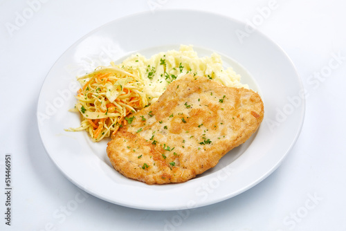 chicken with mashed potato and salad