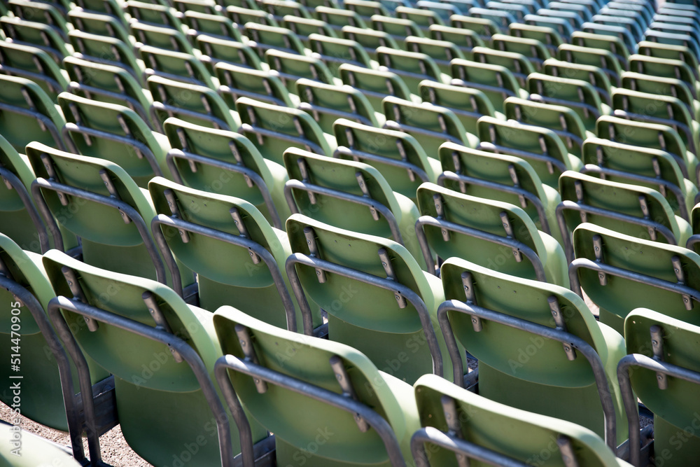 Fototapeta premium Empty Plastic Chairs at the Stadium