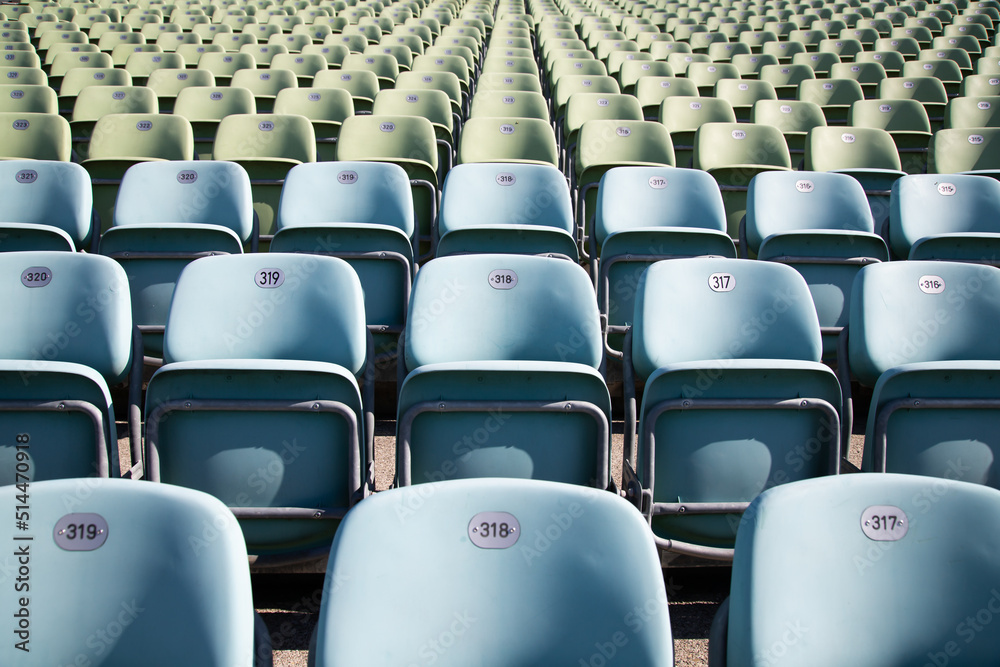 Empty Plastic Chairs at the Stadium Empty Plastic Chairs at the Stadium