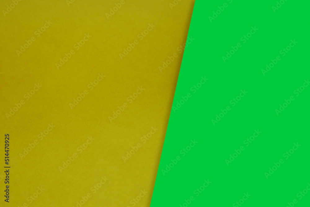 Dark vs light abstract Background with plain subtle smooth de saturated yellow green colours parted into two Dark vs light abstract Background with plain subtle smooth de saturated yellow green colours parted into two