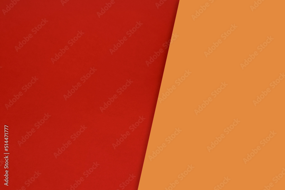 Dark vs light abstract Background with plain subtle smooth de saturated red orange yellow colours parted into two	