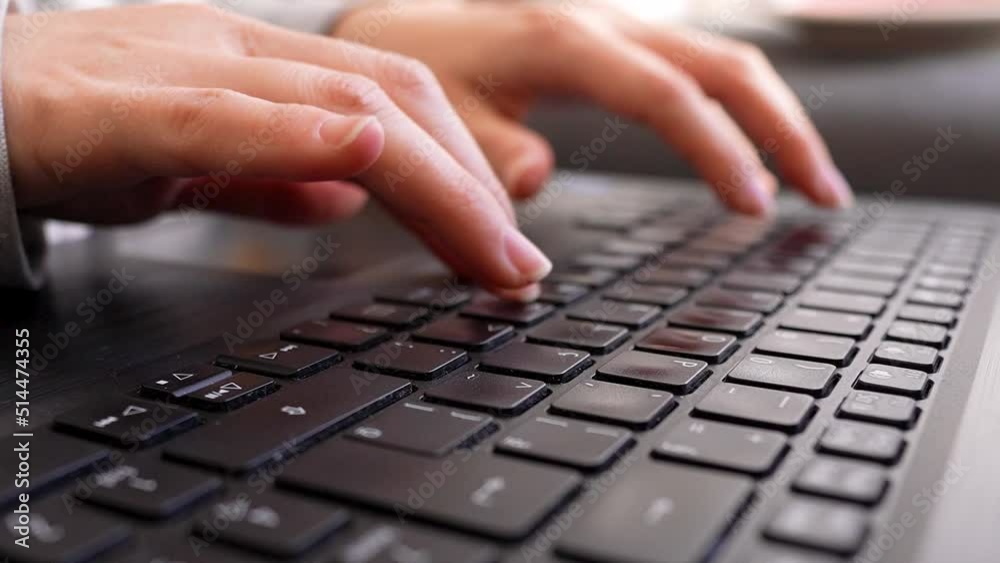 Laptop keyboard female hands typing close-up wide angle shot Laptop keyboard female hands typing close-up wide angle shot