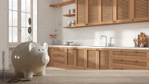 Wooden table top or shelf with white piggy bank with coins, country provencal wooden kitchen, expensive home interior design, renovation restructuring concept architecture