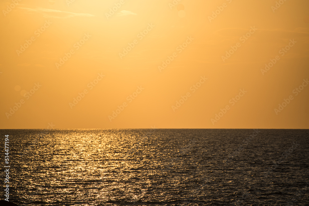 ocean with orange sky during sunset, for background purpose ocean with orange sky during sunset, for background purpose