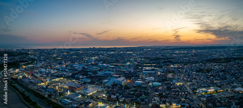 Panoramic aerial view of sprawling city after sunset © Osaze
