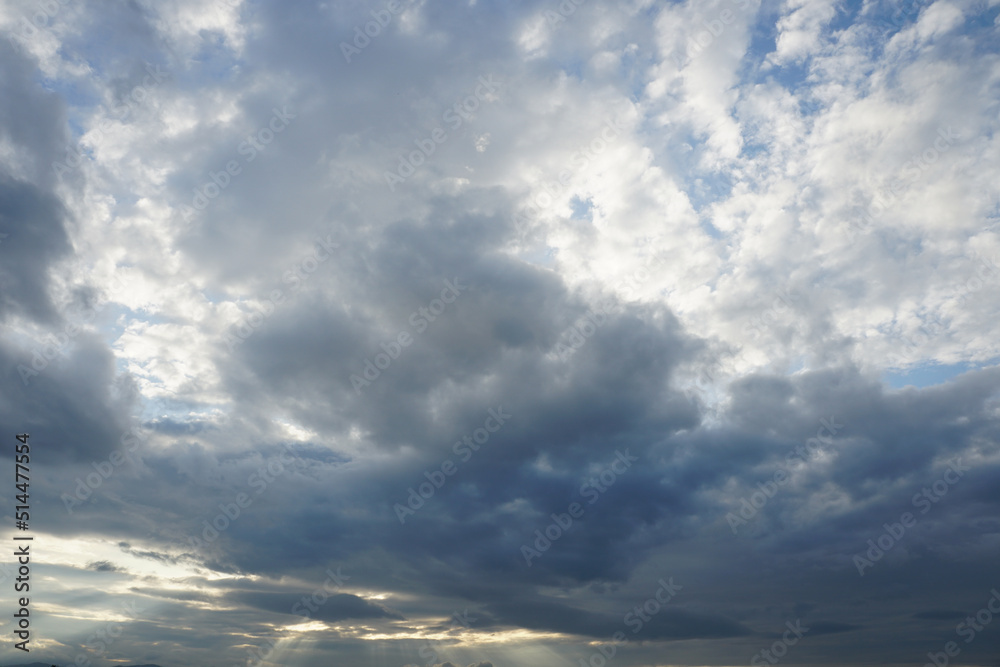 Obraz premium Nimbostratus clouds are dark, grey, featureless layers of cloud, thick enough to block out the Sun and produce persistent rain.