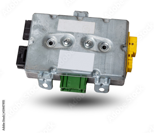 Plastic car engine control unit with metal elements on a white isolated background is the connecting center of various subsystems, units and assemblies. Monitoring the state of the moment. Spare part. photo