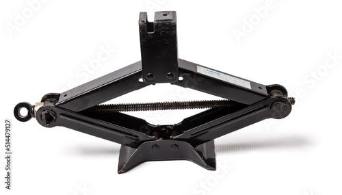 Konstfotografi Black metal jack-screw for replacing a car wheel on a white isolated background in a car service