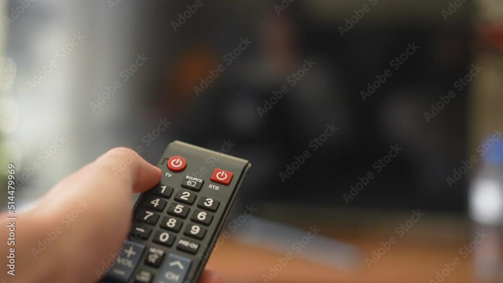 Turning off with remote controller close-up shot Turning off with remote controller close-up shot