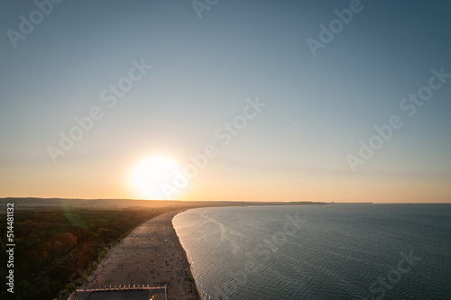 Top view of the beach and the Baltic Sea at sunset in Gdansk