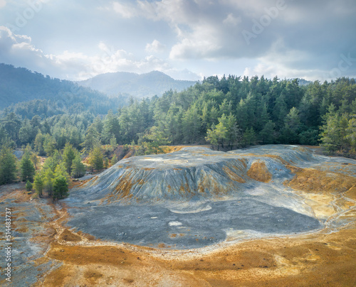 Ore stockpiles at abandoned Mala pyrite mine in Paphos forest, Cyprus photo