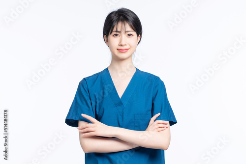 Asian female nurse on white background