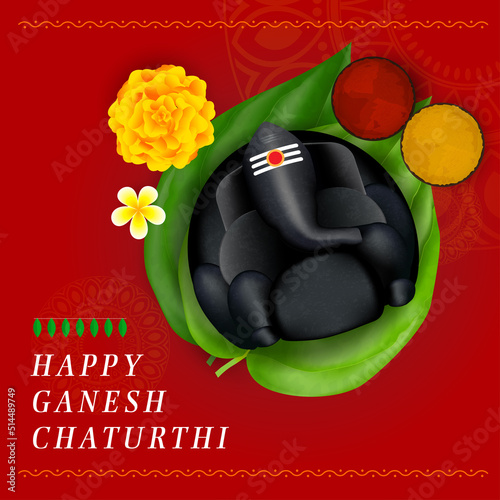 Happy Ganesh Chaturthi and lord ganesha idol in Betel Leaf 