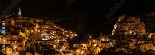 Famous cave church Saint Mary of Idris and the cathedral of Matera at night, Southern Italy