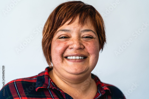 Portrait of curvy mature woman smiling in camera
