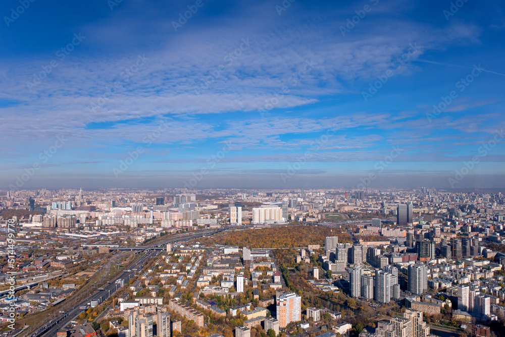 Aerial view of the north of Moscow from the observation deck in Moscow City on a sunny autumn day