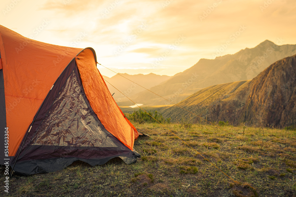 hiking tent in the mountains in summer  - obrazy, fototapety, plakaty 