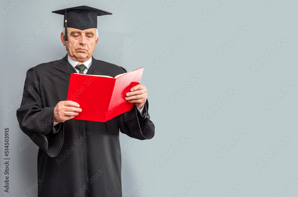 Academician, Professor, Prof is wearing a cap with Tassel and black gown. Senior educator or Doctor of Philosophy, learned man from a university or college Academician, Professor, Prof is wearing a cap with Tassel and black gown. Senior educator or Doctor of Philosophy, learned man from a university or college