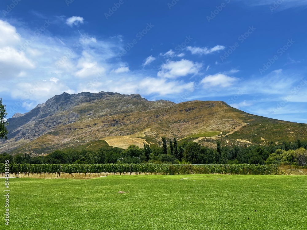 Mountain and valley with flat field in front