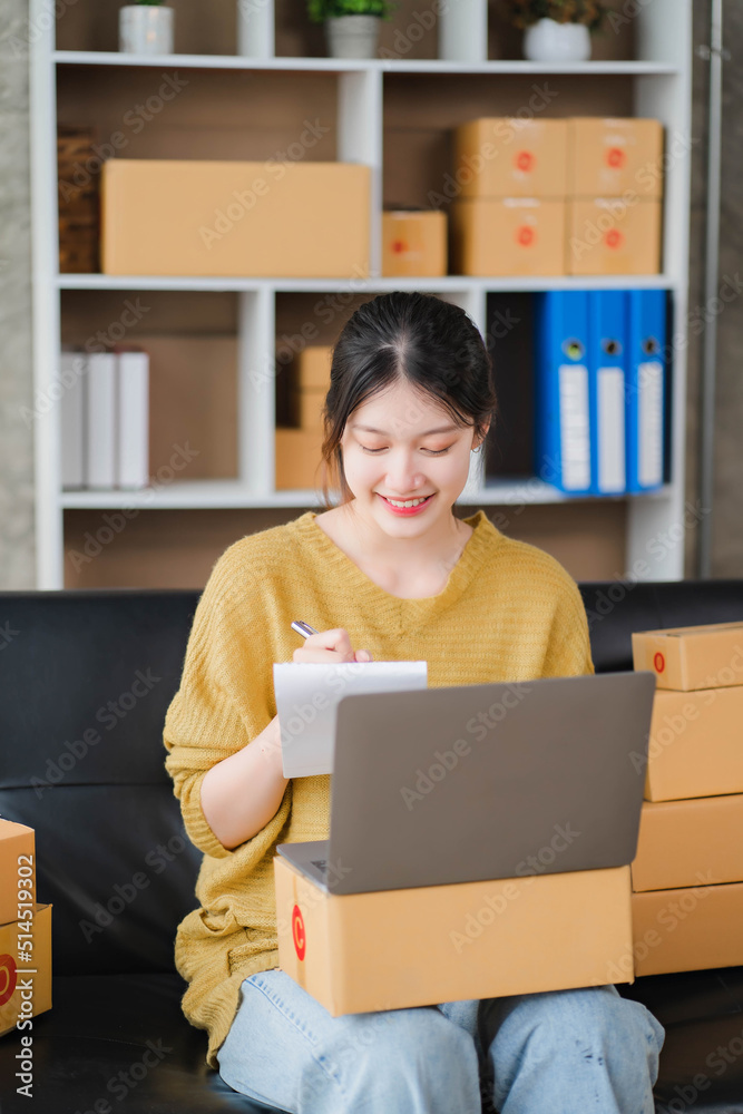 Successful online business owner happy and thrilled with laptop computer at office Successful online business owner happy and thrilled with laptop computer at office