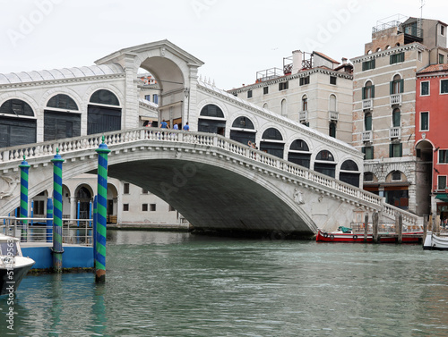 unusual view of the Rialto Bridge in Venice with very few boats and no people during the lockdown in Italy © ChiccoDodiFC