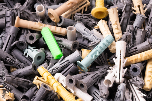 Group of plastic anchors or dowel. Close-up