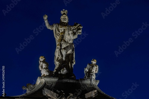 statue of saint peter at night