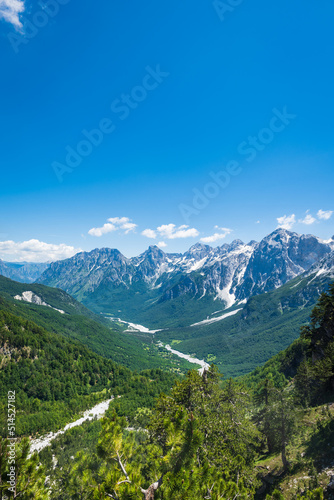 Albanian Alps view. Accursed Mountains landscape viewed from Valbona and Theth hiking trail in Albania, popular hiking trail in the Albanian Alps. © uskarp2