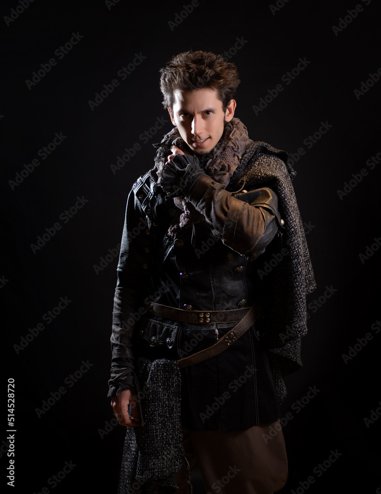 Fototapeta premium A guy in a steampunk or post-apocalyptic image, portrait on a black background