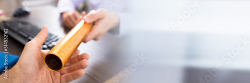 Person Passing Baton To Businessman