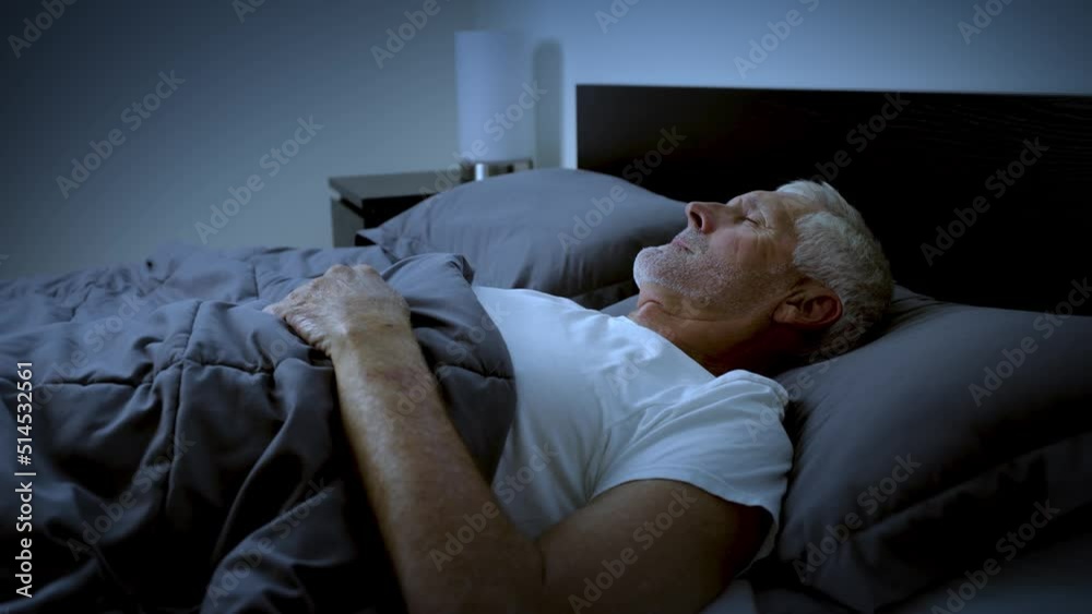 Mature adult sleeping at night